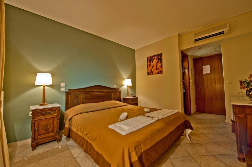 Hotel Bacchus Olimpia Habitación foto